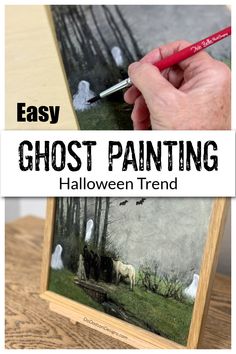 a hand is holding a paintbrush and painting a picture with the words easy ghost painting on it