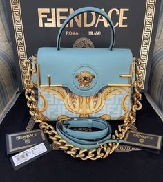 Fendace Fendi X Versace Collaboration La Medusa Turquoise Black Gold Bag Luxury Turquoise Travel Bags, Luxury Turquoise Top Handle Bag, Luxury Turquoise Evening Bag, Versace Bags Women, Versace X Fendi, Fendi X Versace, Handbag Closet, Gold Handbag, Western Outfits Men