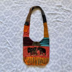 This Bag Is A Multicolored, 100 Percent Handmade And Hand Sown Shoulder Bag, Made With A Strong Durable Cotton, This Bag Contains Lots Of Storage, To Store Many Of Your Belongings. This Bag Was Made By An Independent Seller And Is Brand New But Without Tags. I’m Open To Negotiations. Red Cotton Pouch Bag, Multicolor Hobo Bag For Market, Multicolor Shoulder Bag With Adjustable Strap For Market, Multicolor Shoulder Hobo Bag For Market, Multicolor Hobo Bag For Everyday, Casual Multicolor Shoulder Bag For Market, Red Bohemian Shoulder Bag For Everyday, Handmade Red Cotton Bags, Bohemian Red Hobo Bag For Everyday