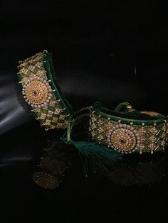 Green Velvet Pounchi ,Adorable Bracelet/ gold Bead Beaded, Resham Thread Traditional Adjustable Jewelry With Latkans, Green Chandbali Jewelry For Rituals, Adjustable Bangle Bracelet For Diwali, Green Bracelet Jewelry For Festivals, Bohemian Bracelets For Diwali Ceremonial, Adjustable Temple Jewelry Bracelets For Diwali, Traditional Jewelry With Stone Work For Festivals, Adjustable Traditional Bracelets For Navratri, Bohemian Kundan Bracelets For Festivals