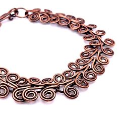 Twenty-eight Egyptian coils make up the links in this copper bracelet. Finished in a beautiful golden brown patina. length: 6 3/4"width: 1/2"closure: hook and eyemetal: oxidized copper Entirely handmade in Lincoln, Nebraska Lincoln Nebraska, Oxidized Copper, Copper Bracelet, Golden Brown, Coils, Semi Precious Gemstones, Nebraska, Link Bracelets, Lincoln