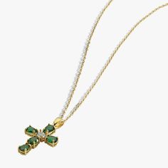 The 14K Solid Gold Emerald Cross Pendant is both a daily symbol of faith and a special occasion jewelry. Its timeless elegance and deep symbolism make it a beloved gift for any event, offering versatility for milestones, celebrations, or as a gesture of affection. Material: 14K Solid Gold Closure: Spring ring Gemstone: Lab Grown Emerald Chain style: Cable Style: Minimalist