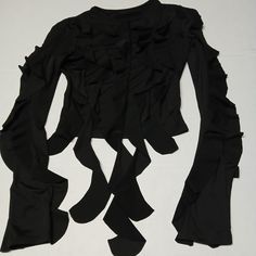 Black Gothic "Octopus Tentacle" Long-Sleeved Blouse Top Shredded Ruffle Details On Edges Of Sleeves And Down The Front Of Blouse Size Women's Small. Please See Photos For Measurements. Poly/Spandex Blend. Very Stretchy! Unbranded. No Hang Tag But New And Never Worn Otherwise. All Items Come From Smoke-Free And Pet-Free Home. Check Out My Other Listings For More Fun And Unique Women's Fashion, Footwear, And Accessories! Thanks For Looking! Gothic Blouse, Black Ruffle Blouse, Victorian Vampire, Punk Shirt, Unique Womens Fashion, Black Goth, Fashion Footwear, Blouse Top, Ruffle Trim