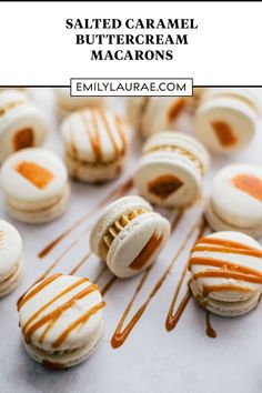 salted caramel buttercream macarons are arranged on a white surface