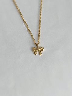 A sweet golden necklace that's so stunning on and matches everything. An absolute essential in every jewelry collection. Our chains are 100% stainless steel and hypoallergenic so they won't rust, tarnish, or turn your neck green. - Water resistant - Lobster clasp closure - Stainless steel chain + pendant - Select desired size at checkout Dainty Gold Plated Necklaces For Birthday, Dainty Gold-plated Necklace For Birthday, Dainty Gold Plated Necklace For Birthday, Hypoallergenic Gold Plated Charm Necklaces As Gift, Hypoallergenic Gold Plated Charm Necklace For Gift, Gold Clavicle Chain Charm Necklace As Gift, Adjustable Gold Charm Necklace For Gifting, Adjustable Gold Charm Necklace For Gifts, Adjustable Gold Charm Necklace As A Gift