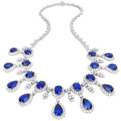 37.93 carats of oval and pear shape sapphires are framed with 12.89 carats of round brilliants in this show-stopping important necklace. Set in 18-karat white gold. 508 Diamonds = 13.89 carats 18 Blue Sapphires = 37.93 carats Total length 16" Stamped K18 JT Appraisal From Cellini jewelers NYC upon request Drop Necklaces, Blue Sapphire Necklace, Antique Necklaces, Expensive Jewelry, Antique Necklace, Vintage Necklaces, Sapphire Necklace, Antique Diamond, Sapphire Jewelry