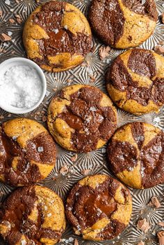 chocolate chip cookies on a plate with some dipping sauce