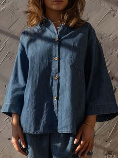 Meet our best-selling Linen Shirt, now in soft, denim chambray! This relaxed-fit button down-shirt for women has wide sleeves and a boxy fit that makes it the perfect everyday piece for the warm weather. We love it paired with The Chambray Denim Short or The Wide Leg Jean.Our small-batch wash process means that each of our denim garments will vary slightly in color and appearance.• Composition: 100% cotton• Available in: MID DENIM• US sizes: XS (US 0–2), S (US 4–6), M (US 8–10), L (US 12–14), XL Medium Wash Relaxed Fit Button-up Shirt, Washed Blue Chambray Button-up Denim Top, Relaxed Fit Light Wash Denim Top, Relaxed Fit Light Wash Denim Top For Day Out, Everyday Light Wash Chambray Denim Top, Everyday Light Wash Chambray Tops, Everyday Light Wash Button-up Denim Top, Light Wash Denim Top For Everyday, Oversized Tops For A Day Out