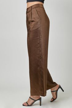 Mara Pants Final sale | Not eligible for return or exchange Excluded from further discounts Introducing the Mara Pants, a luxurious addition to your wardrobe. These satin pants in rich chocolate are crafted for comfort and style. Elevate any outfit with their smooth, sophisticated finish and indulge in the ultimate indulgence of luxury fashion. Perfect for any occasion, the Mara Pants are a statement piece that exudes elegance and grace. Classic Wide Leg Satin Pants, Classic Satin Pants For Workwear, Classic Satin Trousers, Solid Silk Pants For Workwear, Chic Brown Wide Leg Pants, Chic Wide Leg Brown Pants, Silk Straight Pants In Solid Color, Sleek Brown Workwear Pants, Chic Brown Wide-leg Pants