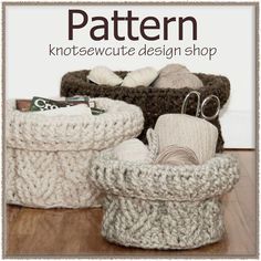 two knitted baskets sitting on top of a wooden floor