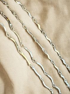 Belly Chains are a stylish way to accentuate your curves? Crafted from stainless steel, this chain is both safe and stunning. Add our chic charms to your chain to create a personalized accessory that's perfect for everyday wear or special occasions! WHAT'S INCLUDED: One Belly Chain along with a 4 inch extender! (FOR EXAMPLE: if you choose size Medium it will be a total of 38 inches with 34 inches being the tightest setting) 18K Gold Plated Stainless Steel / Silver Plated Stainless Steel Lobster Modern White Gold Stainless Steel Chain Necklace, White Gold Metal Chain Necklace With Cable Chain, Trendy Sterling Silver Box Chain Necklace, White Gold Delicate Chain Necklace, White Gold Metal Cable Chain Necklace, White Gold Metal Box Chain Necklace, Modern Stainless Steel Chain Necklace For Everyday, Elegant Silver Stainless Steel Chain Necklace, Modern Metal Chain Necklace With Box Chain