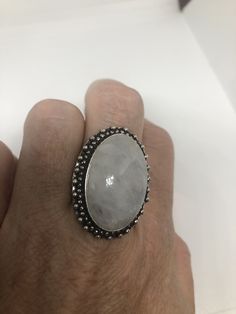 Large Vintage ring set with huge Rainbow Moonstone. Low content silver not sterling About an in long Size 7 can be resized at my jeweler for a $10-$20 fee All rings are shipped free in the US in a nice gift box. Check out our over a THOUSAND great reviews Engraving is $4 per letter and is not always perfect depending on the piece. It can take a few days if the jeweler is busy. This is payable to Paypal Judithsltd@gmail.com Silver Moonstone Ring With Stone Setting As Gift, Silver Oval Crystal Ring With Stones, Silver Crystal Ring With Large Stone As Gift, Sterling Silver Moonstone Ring With Round Cut, Sterling Silver Moonstone Ring With Stones, Silver Rings With Stones As Gift, Silver Rings With Stones For Gift, Adjustable Moonstone Ring Perfect For Gifts, Silver Moonstone Ring With Natural Stones For Gift