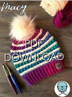 a crocheted hat with a pom - pom on top and the text,