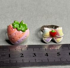 Made with marbled polymer clay and hand painted little accents. wear your favorite fruit whoever you go. adjustable ring base for comfort. Strawberry Cow Ring Clay, Cute Multicolor Rings For Gift, Cute Multicolor Rings For Gifts, Cute Multicolor Rings As Gifts, Cute Multicolor Adjustable Rings, Cute Adjustable Multicolor Rings, Handmade Adjustable Novelty Rings, Adjustable Fun Rings For Gifts, Adjustable Hand Painted Rings For Gift