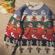 Thick knitted sweater with rows of your favorite winter things. M: 22" across shoulders, 45" chest, 26" lengthL: 23" across shoulders, 47" chest, 26.5" lengthXL: 24" across shoulders, 49" chest, 27" length Holiday Knitted Sweater, Cozy Knit Sweater For Holidays, Holiday Knit Sweater With Crew Neck, Winter Holiday Knit Sweater, Long Sleeve Knit Holiday Sweater, Crochet Christmas Sweater, Cute Christmas Sweaters, Winter Things, Holiday Sweater