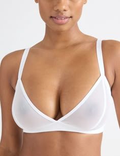 Made with sheer, soft and super sexy single layer mesh. With a deep V neckline perfect for slaying and layering with low-cut tops. Note: this style is made with translucent fabric so nipples will be visible | Knix Mesh Deep V Bra in White Ddd Bra, Sheer Bras, White Mesh Back Sports Bra, Sheer Low-cut Bra For Parties, Unlined Bra Mesh, Deep V Bra Mesh, Fitted Low-cut Sheer Bra, Deep V Bra, Sheer Bra