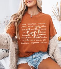 Embrace cozy season with this fall season crewneck shirt that showcases a charming fall aesthetic of autumn activities! Perfect for fall lovers, this Comfort Colors fall shirt is great for a day at the pumpkin patch or celebrating Thanksgiving. Designed for those who love the warmth of the season, this cozy season shirt is a must-have for your wardrobe. Whether you're looking for a pumpkin patch shirt or a Thanksgiving shirt women will love, this aesthetic fall tee captures the "tis the season" Everyday Fall T-shirt With Letter Print, Casual Brown T-shirt For Fall, Cozy Letter Print Tops For Fall, Everyday Cotton T-shirt For Fall, Soft-washed T-shirt For Fall, Cozy Orange Crew Neck Top, Soft-washed Casual T-shirt For Fall, Relaxed Fit T-shirt For Everyday Fall, Trendy Fall Letter Print T-shirt