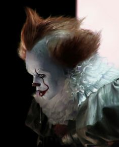 a creepy clown with red hair and white makeup