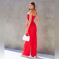 Gorgeous Flattering Halter Jumpsuit In A Perfect Red For The Holiday Season! Red High-waisted Jumpsuits And Rompers For Summer, Chic Red Strapless Jumpsuit For Spring, Casual Red High Waist Jumpsuits And Rompers, Chic Red High-waisted Jumpsuits And Rompers, Red Strapless Jumpsuit For Summer Nights, Chic Red High Waist Jumpsuits And Rompers, Red Fitted Strapless Jumpsuit For Summer, Red Strapless Jumpsuit For Spring Night Out, Red Strapless Jumpsuit For Night Out In Spring