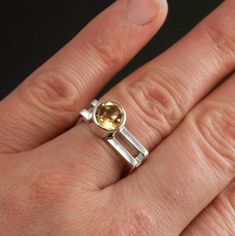 This beautiful Custom Yellow Citrine Square Ring is handmade by me. This could be a wedding or engagement ring, mother's ring, graduation ring, or birthstone ring.  i create this ring by forming sterling silver square wire into two square bands,  soldering them together with spacers, and adding a sterling silver bezel with a natural yellow Citrine set off to the side for a lovely contemporary design. I would be happy to create a custom ring for you, using any colored gemstone of your choice or w Modern Round Gemstones For Anniversary, Modern Gemstones For Anniversary, Anniversary Citrine Birthstone Gemstones, Modern Citrine Jewelry For Anniversary, Citrine Birthstone Ring For Anniversary, Round Citrine Gemstones For Anniversary, Modern Topaz Ring With Center Stone For Anniversary, Anniversary Citrine Birthstone Ring With Bezel Setting, Anniversary Round Citrine Gemstone