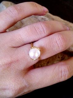 This ring features a delicate White Pearl gemstone set in 14k gold filled ring. => Gemstone Type -Natural Pearl => Gemstone Size - 8mm => Metal Type - 14k Gold Filled (Tarnish Resistant And Nickel Free) ♦ Replace the gemstone with many other gemstones we have in stock My another shops on Etsy http://www.CandySimpleJewelry.etsy.com http://www.CandyCrystalsJewelry.etsy.com Important information **My customer service is available 7 days a week ** All jewelry items will come to you nicely p Adjustable Oval Pearl Ring For Wedding, 14k Gold Pearl Drop Ring For Wedding, 14k Gold Pearl Drop Wedding Ring, Elegant 14k Gold Filled Promise Ring, Elegant Pearl Toe Ring For Anniversary, Elegant Stackable Rose Gold Pearl Ring, Adjustable Pearl Drop Wedding Ring, Adjustable Delicate Yellow Gold Pearl Ring, Adjustable Pearl Drop Ring For Wedding