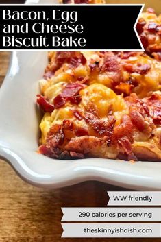 a casserole dish with bacon and cheese on it sitting on a wooden table