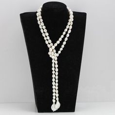 ******ON SALE******The necklace is made of 9mm white color freshwater nugget pearls and 16-19mm white baroque pearlsItem No: NK481Material: freshwater pearlsShape:nugget shape and baroque shapeSize: 9mm and 16-19mm Color: whiteLuster: goodSkin: with flawsQuality: ABead:silver 925Hand Knotted: YesNecklace length: 55inch,any other length you needPacking: beautiful gift pouch,ready for gift givingIf you need other specific length according to your personal situation,please contact me freely, i will Affordable Long Pearl Necklace, Cheap Adjustable White Long Necklace, White Baroque Pearl Lariat Necklace, White Pearl Lariat Necklace, White Lariat Pearl Necklace With Pearl Drop, White Pearl Drop Lariat Necklace, How To Wear Pearls, Pearl Lariat Necklace, Pearl Lariat