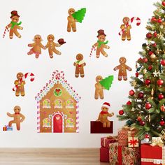 gingerbread christmas wall decals in front of a decorated christmas tree