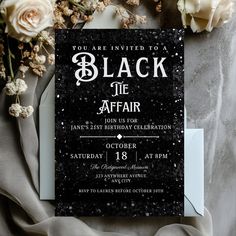 a black and white affair party with flowers