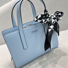 PRD Re-Edition 1995 Brushed Mini Handbag Blue For Women, Women’s Bags 8.6in/22cm Rep 1:1 This handbag, a re-edition of an iconic PRD bag of 1995, is characterized by its elegant geometric silhouette with distinct, minimalist lines. Formal allure and practicality meet in its design with a central zipper closure, enhanced by the sophisticated accent of the screen-printed lettering logo. The accessory is made of fine brushed , an expression of the brand’s expertise. Size: 22 x 18 x 8 cm Prada Re Edition, Louis Vuitton Shirt, Chanel Shirt, Gucci Gg Marmont, Lettering Logo, Mini Handbag, Reversible Belt, Luxury Products, Givency Antigona Bag