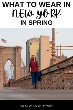 a woman walking across a bridge with the words what to wear in new york in spring