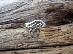 "Eye of Horus ring...3/8\" wide at widest spot, cast in sterling silver 925...ring is a size 8 and can be sized from size 5 to size 8, so when ordering put the size needed in the notes or conversations on the order page....thanks, Bill" Adjustable Spiritual Sterling Silver Engraved Ring, Handmade Symbolic Sterling Silver Engraved Ring, Symbolic Sterling Silver Rings Stamped 925, Spiritual Silver Stackable Rings Stamped 925, Silver Symbolic Toe Rings, Hand Cast Engraved Silver Sterling Ring, Symbolic Hand Cast Adjustable Rings, Symbolic Silver Hypoallergenic Rings, Symbolic Silver Ring With Hand Cast Details