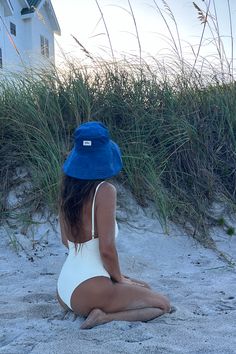 Unlock the charm of sun-soaked California with this uniquely handcrafted, wide brim beach hat. Fashionably chic, the blue corduroy bucket hat not only makes a style statement but also promises optimal sun protection. Perfect for beach lounging or laid-back summer outings, it makes a wonderful gift for the sun-chaser in your life. Embrace the sun, not the burn. Shop now and let the golden state vibes flow through you! Casual Blue Bucket Hat For Beach Season, Adjustable Bucket Hat For Poolside, Uv Protection Bucket Hat For Poolside, Adjustable Poolside Bucket Hat, Blue Summer Bucket Hat, Trendy Poolside Bucket Hat, Upf 50+ Bucket Sun Hat For Poolside, Trendy Bucket Sun Hat For Pool, Blue Bucket Hat For Beach In Summer