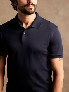 A cut above the rest, this refined polo shirt delivers performance and tailoring thanks to an at-ease fit and soft fabric, infused with Anti-Odor and Moisture-Wicking properties that keep it feel fresh.  Polo collar.  Button placket.  Straight hem wi Mens Attire, Polo Collar, Golf Polo, Men's Style, Button Placket, Soft Fabric, Moisture Wicking, Banana Republic, Men's Polo Shirt