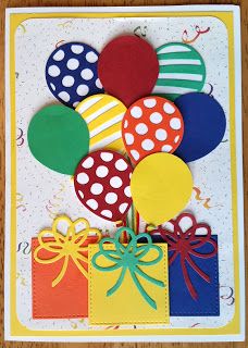 a birthday card with colorful balloons and gift boxes on top of the card is white paper