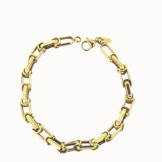 Elevate his style with the timeless elegance of our 18k Solid Yellow Gold Link Bracelet. This exquisite 8-inch piece, weighing 10 grams, is expertly crafted in Italy and captures the essence of sophistication. A perfect gift for men, its hypoallergenic 18k gold construction ensures both quality and comfort. Delivered in an Amalia blue gift box, this bracelet is not just an accessory, but a statement of refined taste Classic Gold-tone Jewelry With Bracelet Strap, Gold Plated Bracelet With Gold Clasp For Formal Occasions, Luxury 14k Gold Chain Bracelet With Gold Clasp, Luxury Polished Link Bracelet, Everyday Metal Bracelets With Gold Clasp, Luxury Metal Bracelet With Gold Clasp, Luxury Metal Bracelets With Gold Clasp, Luxury Oval Link Metal Bracelets, Luxury Metal Oval Link Bracelets