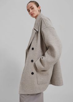 Calgary Oversized Wool Peacoat - Beige – The Frankie Shop Oversized Pea Coat With Double Button Closure For Work, Oversized Double Button Pea Coat For Workwear, Oversized Classic Pea Coat For Fall, Beige Pea Coat With Lapel Collar And Double Button, Winter Oversized Blazer With Double Button, Oversized Outerwear With Lapel Collar And Buttons, Oversized Beige Pea Coat With Lapel Collar, Oversized Notch Lapel Pea Coat For Fall, Oversized Double-breasted Pea Coat For Work