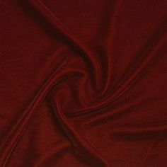 Micro velvet fabric is a high quality 44/45" 100% polyester fabric that has a silky smooth feeling. This luxuriously soft velvet is great for apparel and decorative purposes. It is a non-stretch and heavier fabric compared to the stretch velvet alternative. It is available in bulk quantities in 16 colors and sold by the yard. The polyester content also makes it ideal for washing, although we do recommend taking extra care. Make the most of your next crafts project by adding some quality velvet fabric. Size: 1 Yard.  Color: Red. Fabric Wholesale, Fuzzy Texture, Designers Home, Silk Velvet Fabric, Pipe And Drape, Blue Black Color, Velvet Blanket, Skating Dress, Fabric Ideas