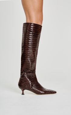 The Maverick Calf Boot is made from 100% Chrome-Free Calf Nappa Leather with a luxuriously thick embossed crocodile print texture. This style features a cowboy cut out contrast panel over the toes with heavy stitch detailing, soft suede lining, a straight cut relaxed leg and a squared Victorian undercut 50mm leather covered heel.The leather used in this design while thick, is very soft and can be worn pulled up as a straight but relaxed style or can be pushed down for a scrunched boot effect. The soft suede lining ensures this style is luxuriously soft but should be worn with slim stockings to allow for easy wear.This style is a standard fit. Made from 100% Chrome-Free Calf Nappa Leather. To prevent premature ageing/staining we recommend using a quality leather protector that is free from Vintage Hunting, Print Texture, Hunting Boots, Crocodile Print, Boot Accessories, Flat Boots, Calf Boots, Nappa Leather, Soft Suede