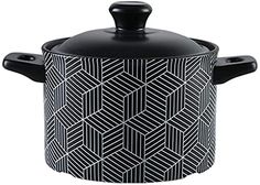 a black and white patterned pot with lid