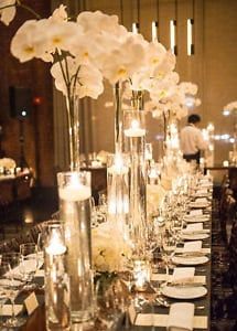 Amazing Wedding Centerpieces, Tall Glass Vases, Orchid Centerpieces, Flowers And Candles, Tall Wedding Centerpieces, Winter Wedding Flowers, Orchid Wedding, Spring Wedding Flowers, Wedding Table Decorations