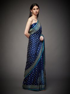 Editor's Note Embrace royal elegance with our royal/turquoise ari with tikki-h embroidered parampara ari 60 kasab sari, complete with an unstitched blouse. This ensemble is the epitome of traditional opulence, perfect for special occasions and events where you want to make a regal and sophisticated statement. The intricate embroidery and rich color combination ensure you stand out and leave a lasting impression. With the convenience of an unstitched blouse, you can customize your look to your li Festive Blue Tussar Silk Pre-draped Saree, Blue Tussar Silk Pre-draped Saree With Dupatta, Blue Pre-draped Saree With Unstitched Blouse In Tissue Silk, Blue Pre-draped Tissue Silk Saree With Unstitched Blouse, Designer Blue Tissue Silk Pre-draped Saree, Blue Tissue Silk Pre-draped Designer Saree, Blue Tissue Silk Pre-draped Saree For Designer Wear, Blue Bollywood Style Pre-draped Tissue Silk Saree, Elegant Blue Chanderi Pre-draped Saree