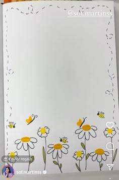 a white paper with yellow flowers and bees on it next to some crayons