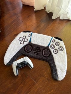 a video game controller laying on the floor