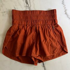 Brand: Fp Movement By Free People Style: The Way Home Shorts Color: Rust Size: Medium Condition: Brand New Without Tags Yoga Shorts With Waistband For Summer, Orange Bottoms With Built-in Shorts For Vacation, Casual Orange Yoga Shorts, Orange Vacation Shorts, Stretch Orange Bottoms With Pockets, Orange Stretch Bottoms With Pockets, Stretch Orange Bottoms For Vacation, Summer Orange Shorts With Built-in Shorts, Orange Cotton Shorts With Elastic Waistband