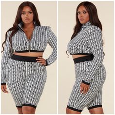 Chic And Modern 2pc Set In Black And White Print Features A Mock-Neck Cropped Zip Up Long Sleeve Top With Structured Shoulders Followed By High Waist Bodycon Shorts With A Thick Black Elastic Waistband. Athletic Fit Nylon 7%, Polyester 90%, Spandex 3% Additional Matching Top Safety Pin T-Shirt Top/Dress Features Short Sleeves, A Longline Silhouette, Crew Neck, And A Lion Head Logo Embellishment And Golden Safety Pin Details Throughout. Self: 80% Cotton, 20% Spandex Fitted Two-piece Set For Loungewear, Fitted Long Sleeve Top With Matching Set, Fitted Two-piece Top For Loungewear, White Fitted Sets For Loungewear, White Stretch Matching Sets, Fitted White Matching Set Tops, Fitted White Two-piece Top, Fitted Two-piece White Top, White Fitted Two-piece Tops Set