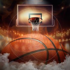 a basketball flying through the air next to a basket on top of a basketball court