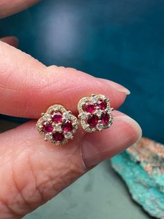 14k yellow gold earrings featuring round red rubies with diamonds. .60 ctw rubies.22 ctw diamonds Ruby Earrings Gold, Red Ruby Earrings, Cute Engagement Rings, Yellow Gold Earrings, Clover Earrings, Diamond Free, Ruby Earrings, Ruby Jewelry, Yellow Gold Earring