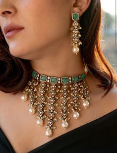 Enhance your traditional attire with this Stunning Choker necklace set. This intricate piece is encrusted with polkis and cubic zirconia, complemented by mint flourite stones for a touch of elegance. The trinkets of pearls and mint onyx add a classic touch. Complete the set with the matching earrings for a stunning traditional statement look.  Necklace Closure - Adjustable Dori Earrings Closure - Push Back  A feeling more than just material pleasures, our range of everyday jewels is like a ritua Latest Nakshi Jewellery, Pearl Bridal Jewelry Sets, Sabyasachi Designer, Jewelry For Wedding, Necklace Closure, Choker Necklace Designs, Choker Designs, Polki Necklace, Antique Jewelry Indian