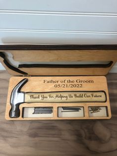 the groom's gift set is in its wooden box and includes two razors